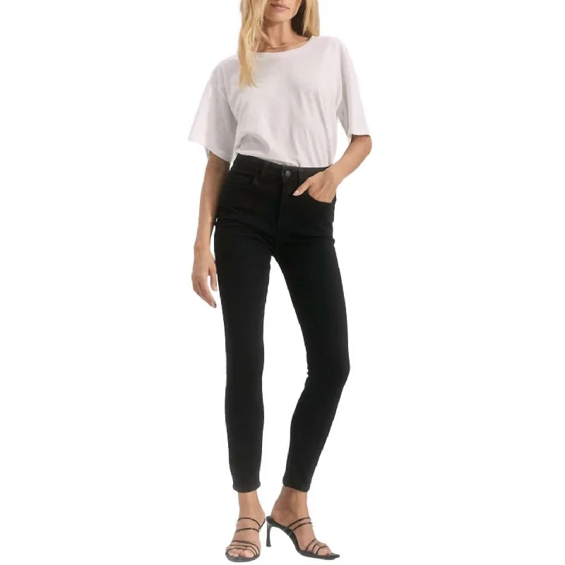 Tight-fitting trousers for men with stretchable material for flexibility and comfort -Larchmont Skinny Jeans In Onyx