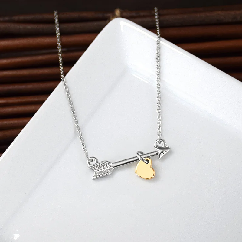 Necklaces and pendants with lock and key designs for a symbolic gesture-Go Confidently Arrow Necklace - Silver finish with gold heart charm